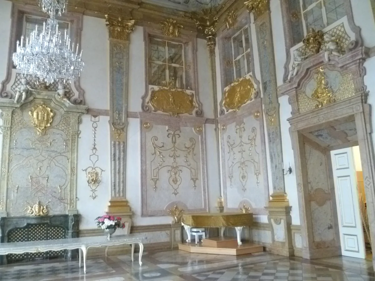 The gilded and marble interior of the Marble Hall at Mirabell Palace