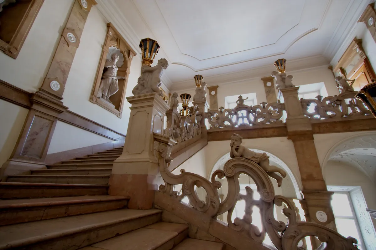 The Angel Staircase (Donnerstiege) at Mirabell Palace, lined with marble cherubs